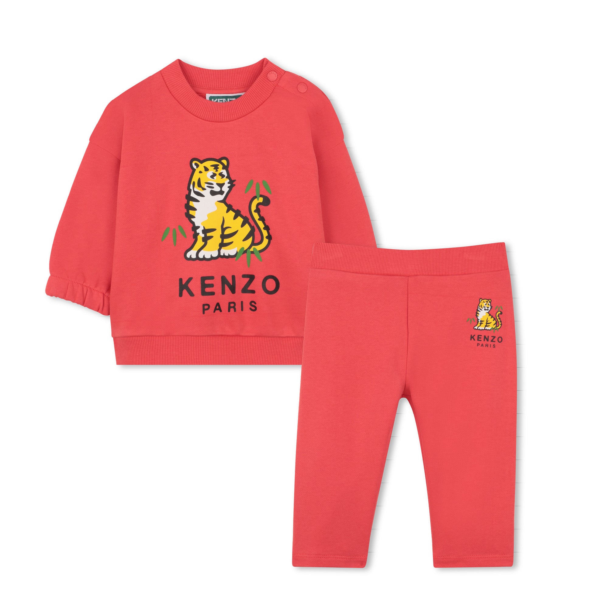Red children's sweatshirt and pants set with a tiger logo and 'Kenzo Paris' text on a white background.