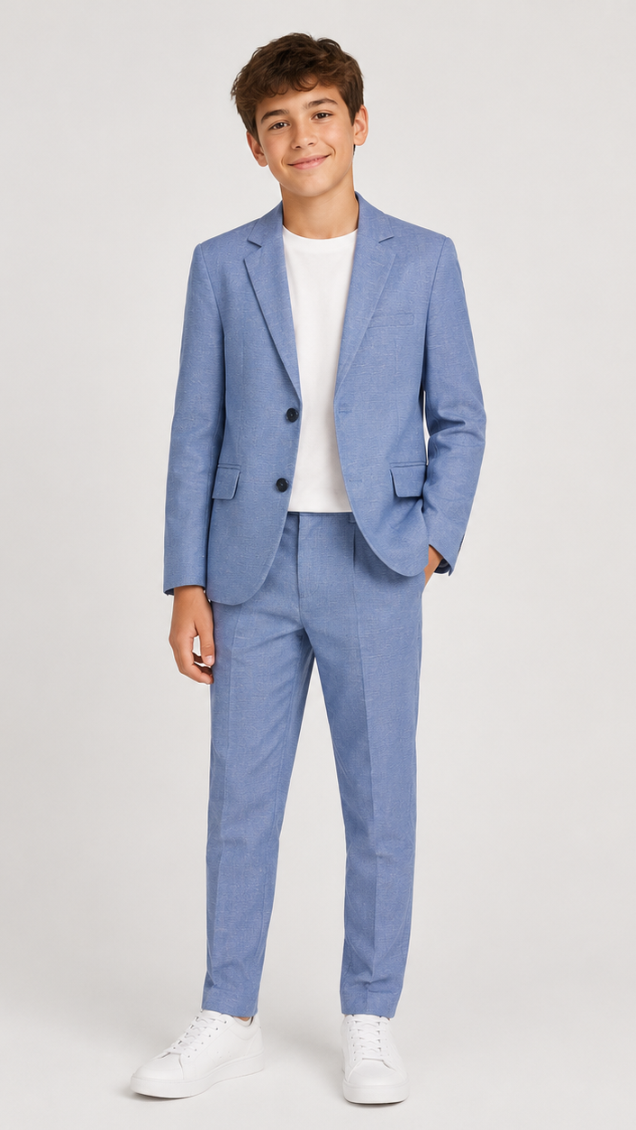 Person wearing a light blue suit with a white shirt on a plain background