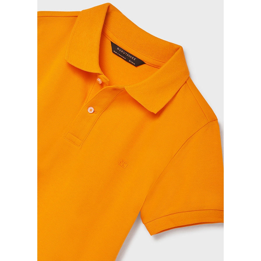 Close up detail of classic short sleeved ORANGE Polo shirt. 100% Sustainable cotton