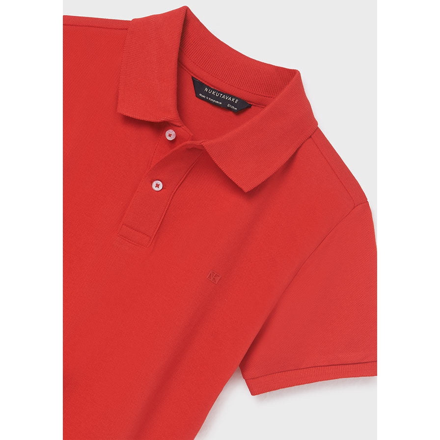 Close up detail of classic short sleeved RED Polo shirt. 100% Sustainable cotton